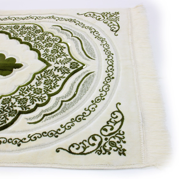 white and green prayer mat