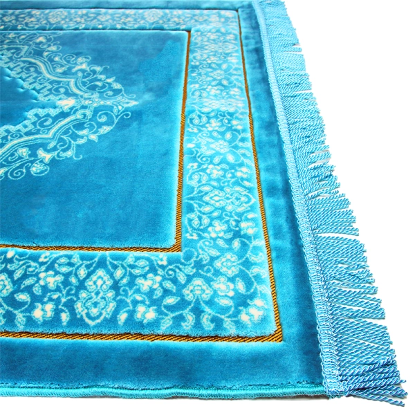 turquoise and white pattern prayer mat