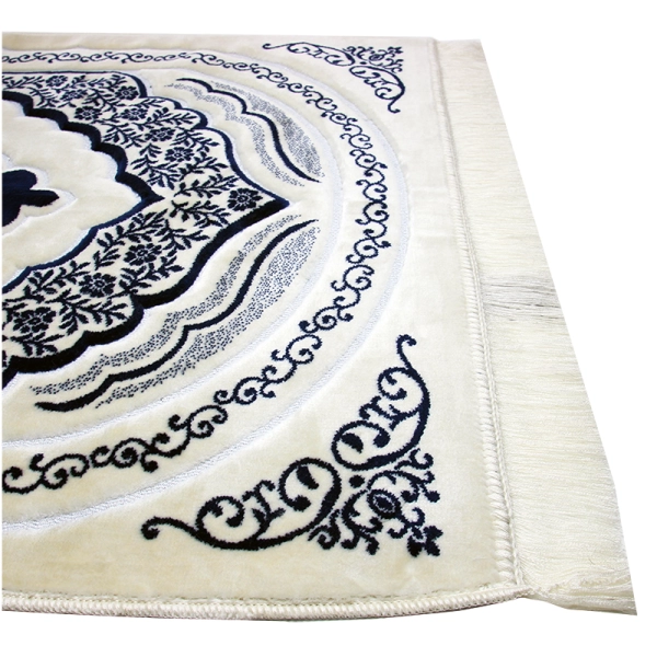 white & blue pattern Muslim prayer mat