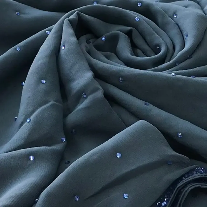 Emirati chiffon with stone embellishments teal blue
